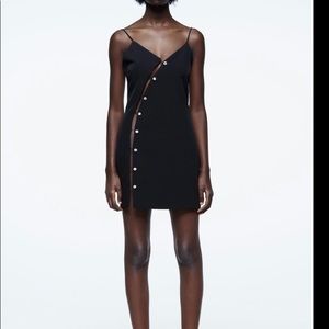 Buttoned dress with jewels